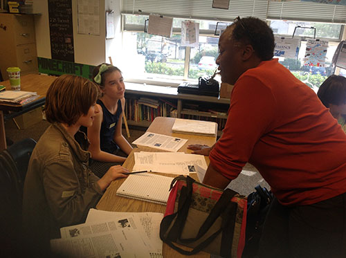 woman talking with students 